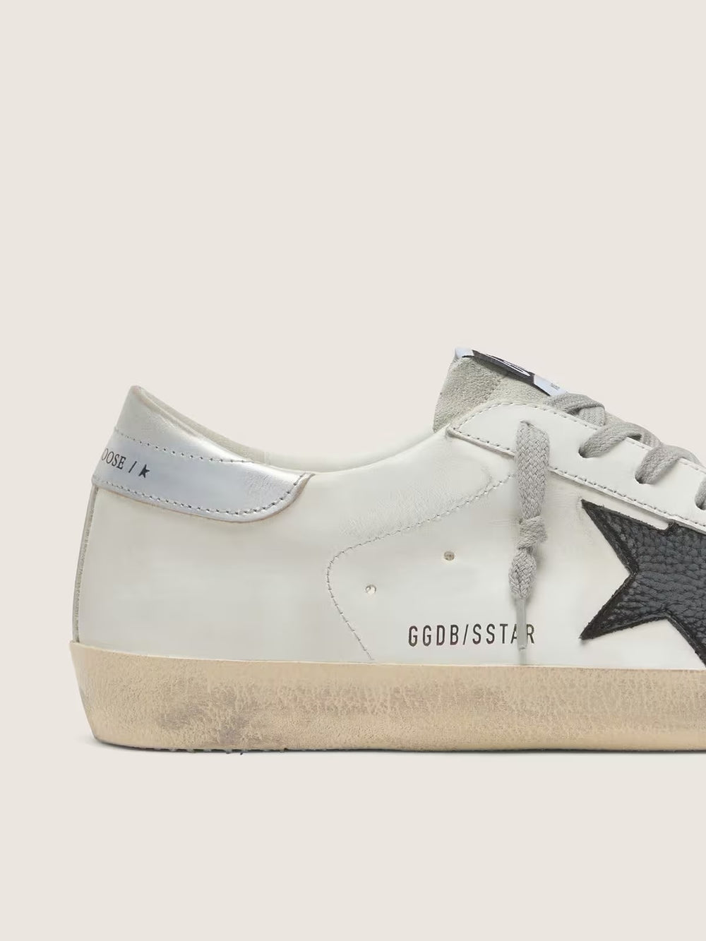 Golden Goose Men's Super-Star in white leather with black nubuck star and silver metallic leather heel tab